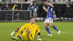 Jerman yang bermain di rumah sendiri babak belur dihajar Jepang 1-4. (AP Photo/Martin Meissner)