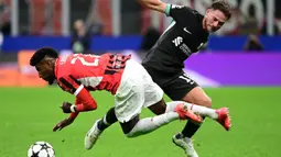 Bermain di Stadion San Siro, Liverpool berhasil mengandaskan AC Milan dengan skor 3-1. Laga kedua tim berlangsung ketat dan sengit. (PIERO CRUCIATTI/AFP)