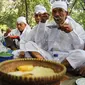 Sebagai solusi pantangan makan nasi, warga Jalawastu memakan jagung yang ditumbuk halus. (Liputan6.com/Fajar Eko Nugroho)