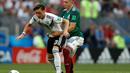 <p>Pemain Timnas Jerman, Mesut Ozil, saat tampil di pertandingan Piala Dunia 2018 kontra Meksiko di Luzhniki Stadium, Moskow, Minggu (17/6/2018). (AP Photo/Matthias Schrader)</p>