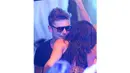 Zac Efron terlihat berbisik mesra pada kekasihnya, Michelle Rodriguez di sebuah club, Billionaire Porto Cervo, Sardinia, Italia. (9/7/14) (TMZ.com)