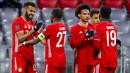 Para pemain Bayern Munchen merayakan gol yang dicetak oleh Eric Maxim Choupo-Moting ke gawang Lazio pada laga Liga Champions di Allianz Arena, Kamis (18/3/2021). Bayern Munchen menang dengan skor 2-1. (AP Photo/Matthias Schrader)