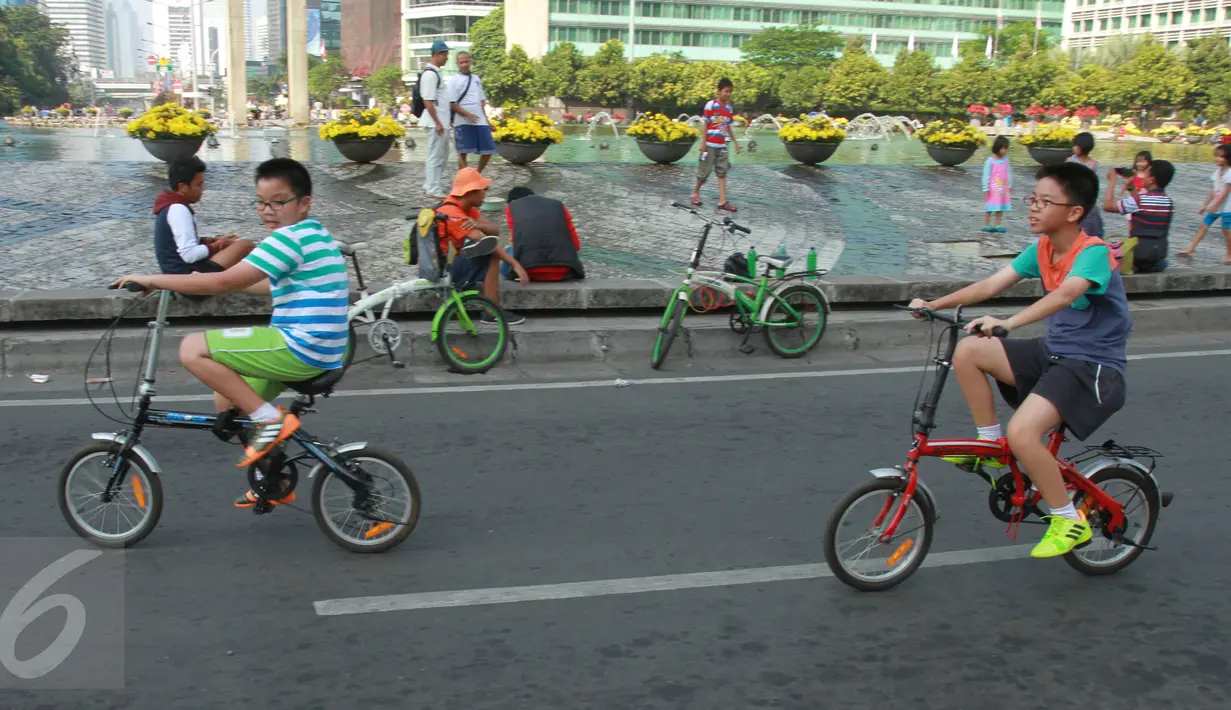 Suasana Car Free Day di Bundaran HI, Jakarta, Minggu (21/6). Pada Bulan Puasa ini suasana di CFD sepi pengunjung dikarenakan sebagian umat muslim menjalankan ibadah puasa. (Liputan6.com/Herman Zakharia)