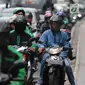 Sepeda motor dan kendaraan lainnya menunggu lampu merah di persimpangan kawasan MH Thamrin, Jakarta, Jumat (20/9). BPTJ Kementerian Perhubungan berencana membatasi volume sepeda motor untuk menekan angka kecelakaan di Ibu Kota.(Liputan6.com/Faizal Fanani)