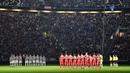 Para pemain Juventsu dan Spal menghentingkan cipta sejenak sebelum memulai laga Serie A di Allianz Stadium, Turin, (25/10/2017). Mengheningkan cipta mengenang fans cilik Anne Frank. (Alessandro Di Marco/ANSA via AP)