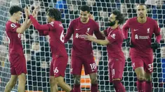 Pemain Liverpool merayakan gol yang dicetak oleh Cody Gakpo ke gawang Everton pada laga Liga Inggris di Stadion Anfield, Selasa (14/2/2023). Liverpool sukses mengalahkan rival sekotanya, Everton dalam lanjutan Liga Inggris pekan ke-23 2022/2023. (AP Photo/Jon Super)