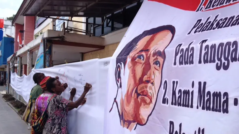 Kaum Ibu di Papua Gelar Tanda Tangan Dukung Pelantikan Jokowi