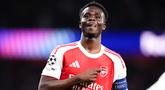 Pemain Arsenal, Bukayo Saka, melakukan selebrasi setelah mencetak gol ke gawang Atletico Madrid pada laga leg kedua semifinal Liga Champions di Stadion Emirates, Rabu (6/5/2026). (John Walton/PA via AP)