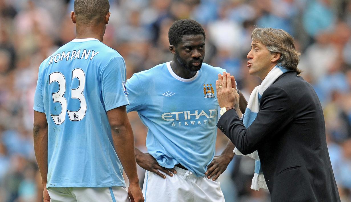 Kolo Toure. Bek tengah Pantai Gading yang kini berusia 41 tahun dan telah pensiun pada Agustus 2017 bersama Glasgow Celtic ini pernah memperkuat Manchester City selama 4 musim, 2009/2010 hingga 2012/2013. Ia menjuarai Liga Inggris bersama The Citizens pada 2011/2012. (AFP/Andew Yates)
