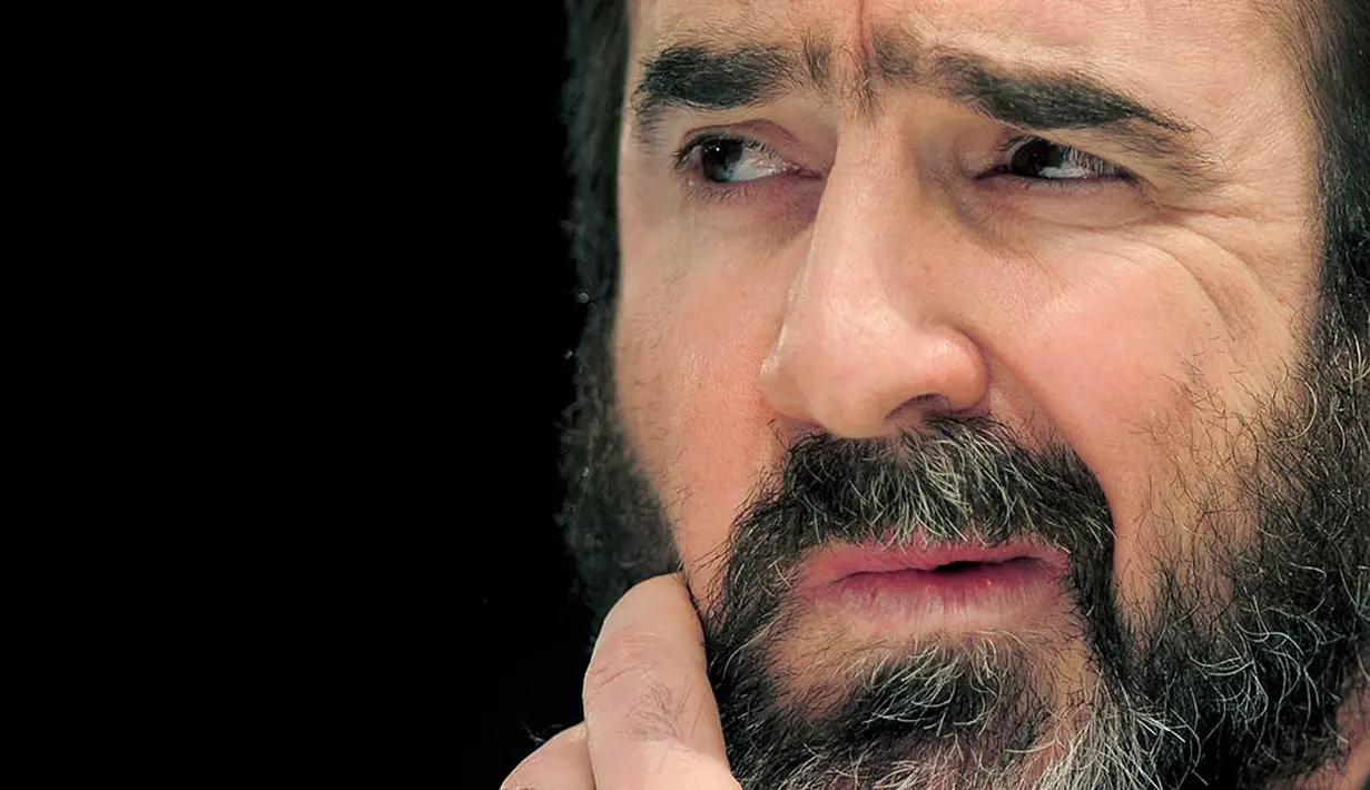 Mantan pemain MU, Eric Cantona, ketika menghadiri Global Sports Forum di Barcelona, Spanyol, Kamis (8/3/2012). (AFP/Josep Lago)