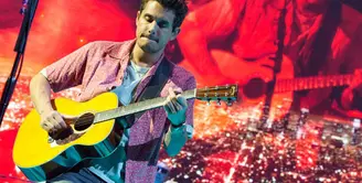 Menjalani gaya hidup sehat memang bukan hal mudah, terlebih bagi mereka yang sudah terbiasa mengonsumsi minuman beralkohol. Tak heran jika John Mayer meras bangga lantaran bisa mengatasi itu. (AFP/Suzane Cordeiro)