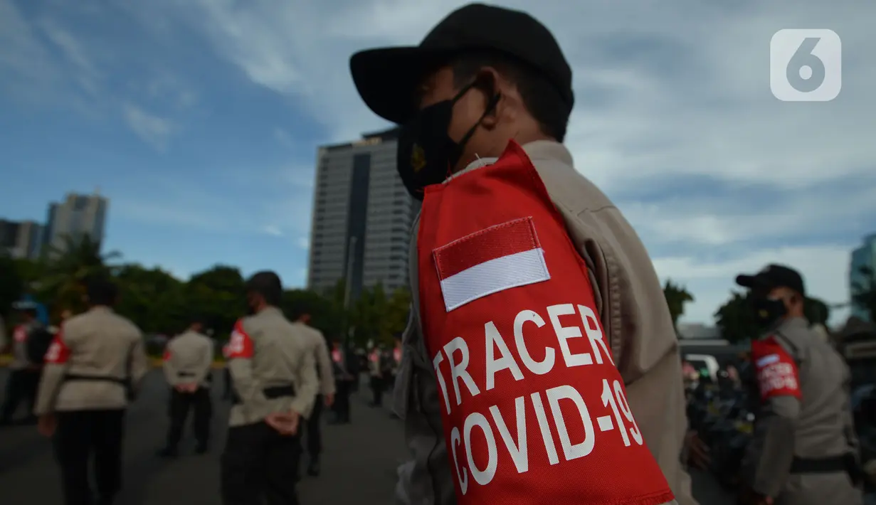 Polda Metro Jaya menggelar apel pelepasan tenaga vaksinator dan tracer COVID-19 di lapangan Promoter Polda Metro Jaya, Kamis (11/2/2021). Polri menyiapkan 40.336 personel Bhabinkabtimas menjadi tracer sebagai langkah deteksi dini dalam mengantisipasi penyebaran corona. (merdeka.com/Imam Buhori)