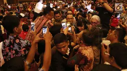 Gubernur DKI Jakarta, Anies Baswedan ketika tiba pada acara perayaan Natal bersama Pemprov dan masyarakat Kristen dan Katholik DKI Jakarta di  Kemayoran, Jakarta, Sabtu (13/1). (Liputan6.com/Herman Zakharia)