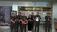 Kejaksaan Agung (Kejagung) resmi menetapkan sembilan tersangka baru terkait kasus dugaan tindak pidana korupsi dalam kegiatan importasi gula di Kementerian Perdagangan Tahun 2015-2016. (Liputan6.com/Nanda Perdana Putra).