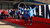 Atlet-atlet Amerika Serikat saat bertolak menuju Olimpiade Musim Dingin Beijing 2022 (AFP/Joe Scarnici)