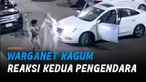 Beredar sebuah rekaman CCTV memperlihatkan tabrakan antara sepeda dan mobil. Namun warganet dibuat kagum oleh reaksi kedua pengendara.
