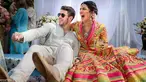 Aktris Bollywood Priyanka Chopra dan penyanyi AS Nick Jonas saat merayakan pernikahan mereka di Istana Umaid Bhawan, Jodhpur, India, Sabtu (1/12). (Handout/Raindrop Media/AFP)