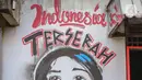 Mural bertuliskan "Indonesia terserah", di Kutabumi, Tangerang, Banten, Senin (27/5/2020). Mural dibuat sebagai bentuk kritik terhadap masyarakat yang tetap beraktivitas di luar ruangan tanpa prosedur protokol kesehatan di tengah wabah COVID-19. (Liputan6.com/Angga Yuniar)