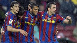 Xavi Hernandez ditunjuk untuk memperbaiki performa Barcelona menggantikan Ronald Koeman. Karena tak terlalu senang dengan personel yang dimiliki, Xavi akhirnya merekrut rekan setim andalannya yaitu Dani Alves. Sejauh ini, Alves telah menyumbang dua assist dalam empat penampilannya. (AFP/Lluis Gene)