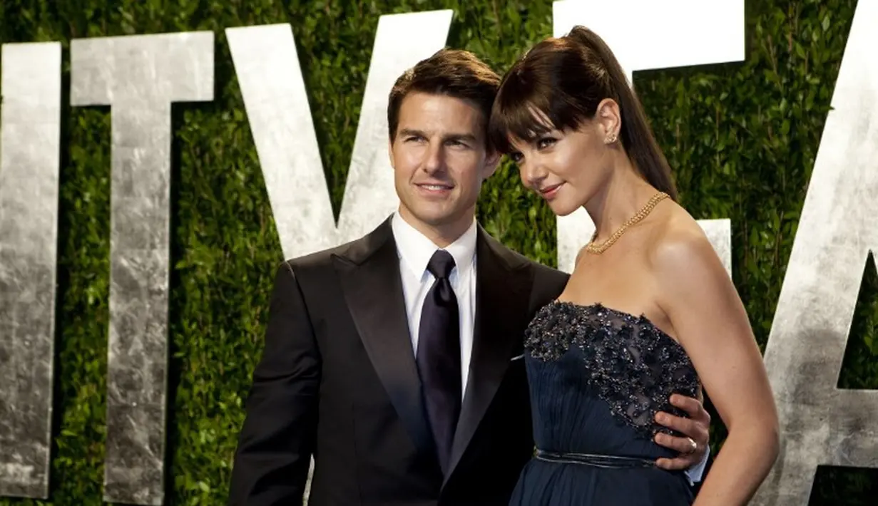 Tom Cruise dan Katie Holmes bertemu April 2005 dan kemudian bertunangan beberapa bulan kemudian. Menikah pada November 2006, pasangan ini pun bercerai pada tahun 2012. (ADRIAN SANCHEZ-GONZALEZ / AFP)