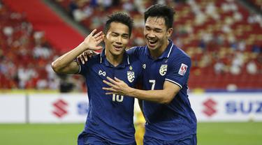 Sebagai salah satu raksasa Asia Tenggara, Thailand memiliki komposisi pemain yang merata di tiap lini, tak terkecuali dalam ajang Piala AFF 2020. Sebagai ujian terakhir untuk melepas dahaga gelar, Timnas patut mewaspadai 5 pemain Thailand berikut di partai final. (AP/Suhaimi Abdullah)