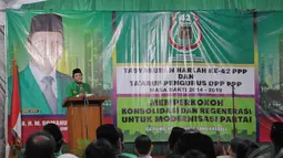 Ketum PPP versi Munas Surabaya, M. Romahurmuziy memberikan sambutan saat acara Harlah ke-42 PPP di Gedung Joang 45, Jakarta, Senin (5/1/2015). (Liputan6.com/Andrian M Tunay)