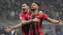 AC Milan berhasil mengalahkan Inter Milan 2-1 dalam Derby della Madonnina di Liga Italia, Sabtu (5/2/2022). Sempat tertinggal 0-1, AC Milan comeback dan memukul balik Inter 2-1 melalui dua gol Olivier Giroud yang menjalani debutnya di derby kota Milan tersebut. (AP/Antonio Calanni)