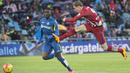 Striker Atletico Madrid, Fernando Torres, berusaha membobol gawang Getafe pada laga La Liga di Stadion Coliseum Alfonso Perez, Spanyol, Minggu (14/2/2016). Getafe takluk 0-1 dari Atletico Madrid. (AFP/Curto De La Torre)