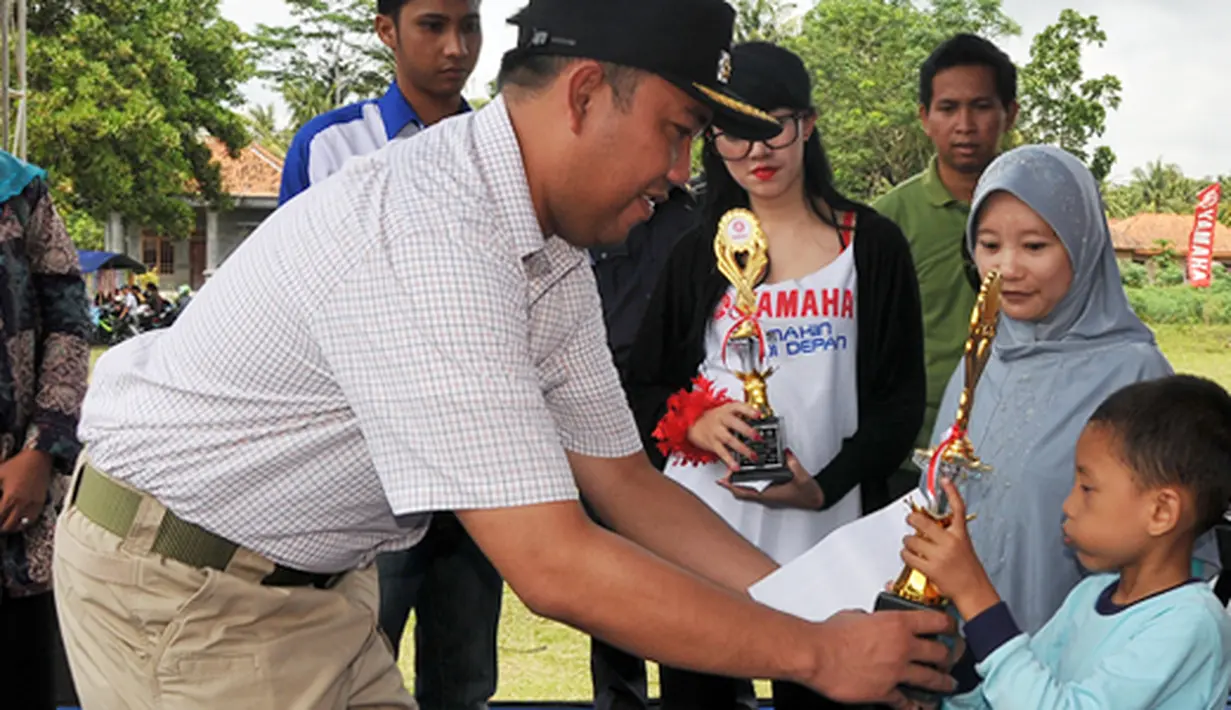 Citizen6, Tulangbawang Barat: Acara mewarnai tersebut berlangsung di Lapangan Merdeka Panaragan Jaya. Sabtu (4/2). (Pengirim: Humas TBB)