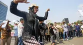 Sejumlah pegiat lingkungan mengikuti aksi memperingati Hari Keadilan Ekologis (HKE) 2026 di depan Gedung MPR/DPR, Senayan, Jakarta, Senin (21/9/2026). Dalam aksi tersebut, peserta turut menyoroti pembangunan panas bumi di kawasan Gunung Gede Pangrango dan persoalan lingkungan lainnya. (KLY/Budy Santoso)