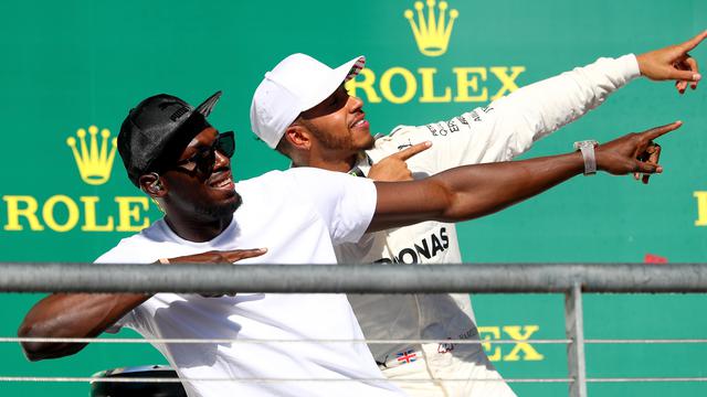 Lewis Hamilton dan Usain Bolt di Podium GP Amerika Serikat