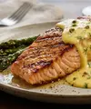 Resep Salmon Panggang Saus Lemon yang Juicy dan Lembut, Praktis Dibuat di Rumah. (AI Generated)