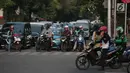 Sejumlah kendaraan menunggu lampu merah di Jalan H. Agus Salim, Menteng, Jakarta, Kamis (4/10). Pada 8-22 Oktober 2018 mendatang Jalan KH Wahid Hasyim dan Jalan H Agus Salim akan diberlakukan uji coba Sistem Satu Arah (SSA). (Liputan6.com/Faizal Fanani)