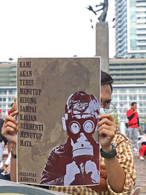 Masyarakat yang tergabung dalam organisasi Lingkar Ganja Nusantara (LGN) Jakarta melakukan aksi yang bertajuk Selamatkan Hutan Indonesia pada Car Free Day di Kawasan Bundaran HI, Jakarta, Minggu (29/9/2019).  (Liputan6.com/Herman Zakharia)