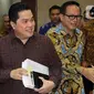 Menteri BUMN, Erick Thohir bersama Wakil Menteri BUMN Kartika Wirjoatmodjo (kanan) seusai mengikuti rapat dengan Komisi VI DPR, di kompleks Parlemen,Senin (2/12/2019). Rapat membahas Penyertaan Modal Negara (PMN) pada Badan Usaha Milik Negera tahun anggaran 2019 dan 2020. (Liputan6.com/Johan Tallo)