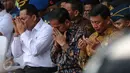 (Ki-ka) Kepala BNN Komjen Budi Waseso, Presiden Joko Widodo (Jokowi) dan Menko Polhukam Wiranto menghadiri pemusnahan barang bukti narkoba yang berhasil dijaring BNN selama dua bulan terakhir, di Monas, Jakarta, Selasa (6/12). (Liputan6.com/Faizal Fanani)