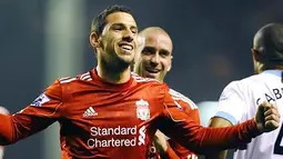 Winger Liverpool Maxi Rodriguez merayakan gol penutup kemenangan 3-0 atas West Ham yang dibukukan di Anfield pada lanjutan Liga Premier, 20 November 2010. AFP PHOTO/PAUL ELLIS