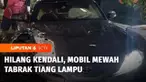 Satu sedan mewah ringsek usai menabrak tiang lampu jalan dan pot besar di pinggir Jalan MH Thamrin, Menteng, Jakarta Pusat.