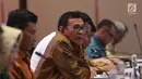 Direktur Utama BNI Achmad Baiquni (tengah) mengikuti Rapat Umum Pemegang Saham Luar Biasa (RUPSLB) di Jakarta, Jumat (30/8/2019). Rapat membahas perubahan susunan pengurus persereoan dengan menyetujui pengangkatan Ario Bimo sebagai Direktur Keuangan BNI. (Liputan6.com/Angga Yuniar)