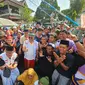 Presiden PKS, Ahmad Syaikhu mengikuti Jalan Sehat Santri Sarungan di Kaliwates, Jember. (Istimewa).