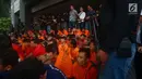Sejumlah tersangka dihadirkan saat rilis Operasi Cipta Kondisi jelang Asian Games 2018 di Polda Metro Jaya, Jakarta, Jumat (13/7). Polda Metro Jaya melakukan operasi ini sejak tanggal 3-12 Juli 2018. (Merdeka.com/Imam Buhori)