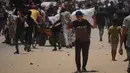 Untuk diketahui, sejak 27 Mei 2025, militer Israel melakukan serangan ke sejumlah zona distribusi bantuan yang didirikan GHF. (AP Photo/Abdel Kareem Hana)