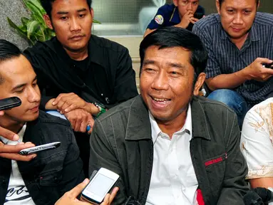 Abraham Lunggana memberikan keterangan pers usai diperiksa Bareskrim Polri, Jakarta, Senin (15/6/2015). Haji Lulung diperiksa sebagai saksi dalam dugaan korupsi pengadaan alat printer dan scanner (3D) di sekolah Jakarta Barat (Liputan6.com/Yoppy Renato)