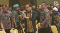 Presiden Joko Widodo tiba menghadiri Musyawarah Nasional XVI HIPMI di Hotel Sultan, Jakarta, Senin (16/9/2019). Munas tersebut bertemakan Melanjutkan Peran HIPMI sebagai Lokomotif Pembangunan Ekonomi Berkeadilan. (Liputan6.com/Angga Yuniar)