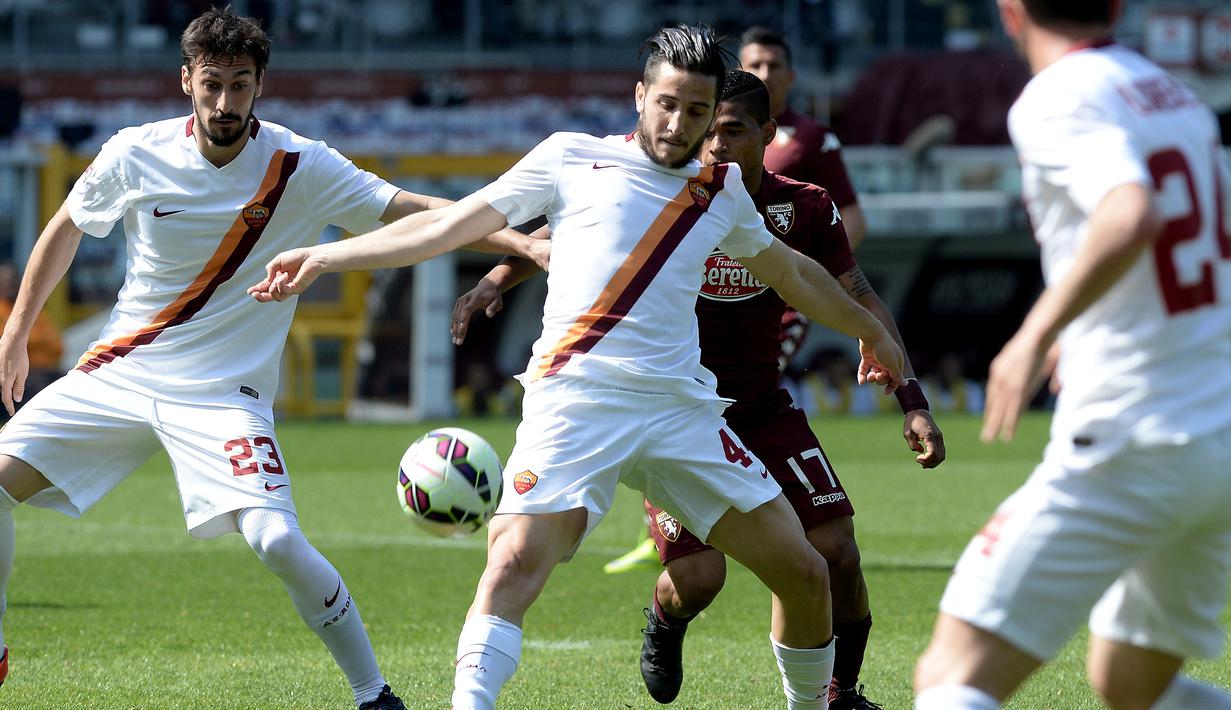 AS Roma kerepotan membongkar pertahanan Torino. Alhasil, I Lupi harus puas bermain sama kuat 0-0 di paruh pertama. (AP Photo/Massimo Pinca)