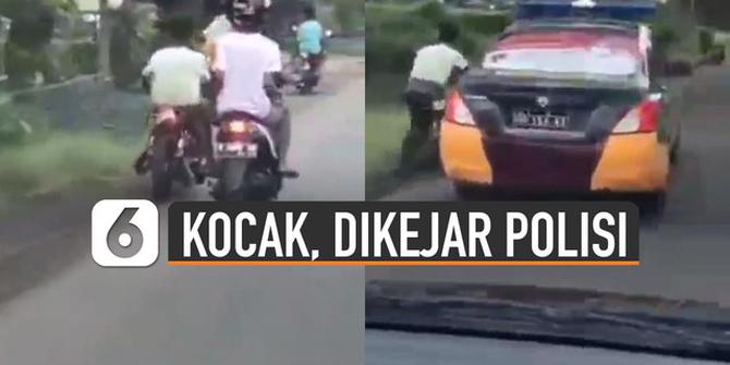 VIDEO: Kocak, Aksi Kabur Pemotor yang Panik Saat Dikejar Mobil Polisi