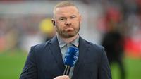 Mantan pemain Timnas Inggris, Wayne Rooney, bekerja untuk Channel 4 TV menjelang pertandingan persahabatan internasional antara Inggris dan Islandia di Stadion Wembley di London pada 7 Juni 2024. (Glyn KIRK/AFP)
