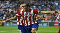 Diego Godin kembali cetak gol penting untuk Atletico Madrid (REUTERS/Paul Hanna)