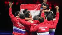 Indonesia juara Piala Thomas 2020 usai menumbangkan China 3-0 di Aarhaus, Denmark, Minggu (17/10/2021). (AFP/Claus Fisker / Ritzau Scanpix)