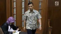 Pimpinan Tjokro Group, Kurniawan Eddy Tjokro bersiap menjalani sidang pembacaan dakwaan di Pengadilan Tipikor, Jakarta, Rabu (12/6/2019). Kenneth Sutardja didakwa dalam kasus dugaan suap kepada Direktur PT Krakatau Steel, Wisnu Kuncoro. (Liputan6.com/Helmi Fithriansyah)